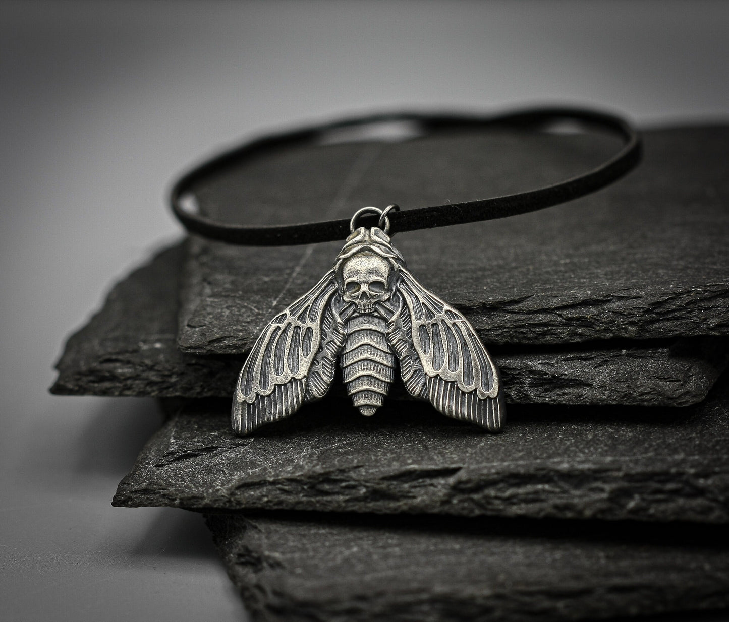 The Death's-head Hawk-moth silver pendant.
