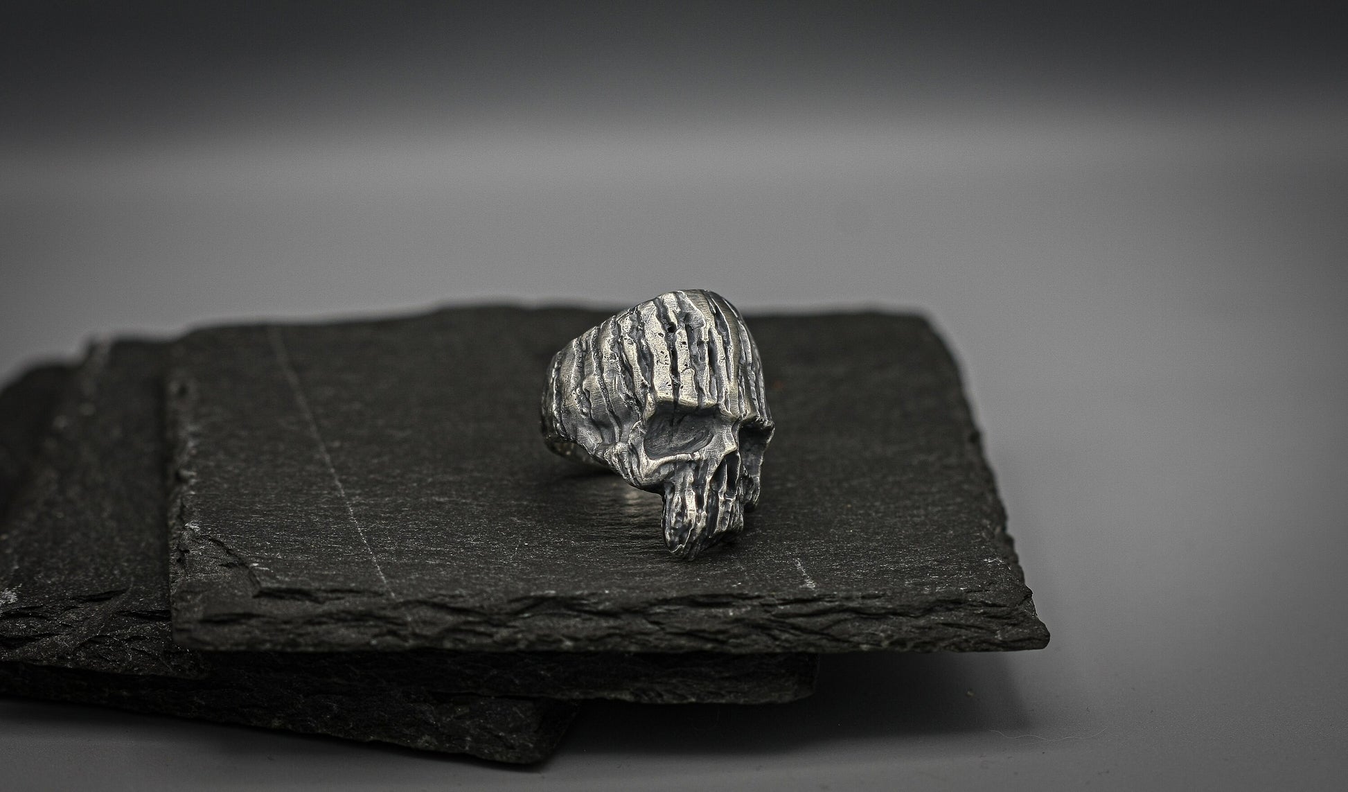 Silver wooden skull brutalist ring