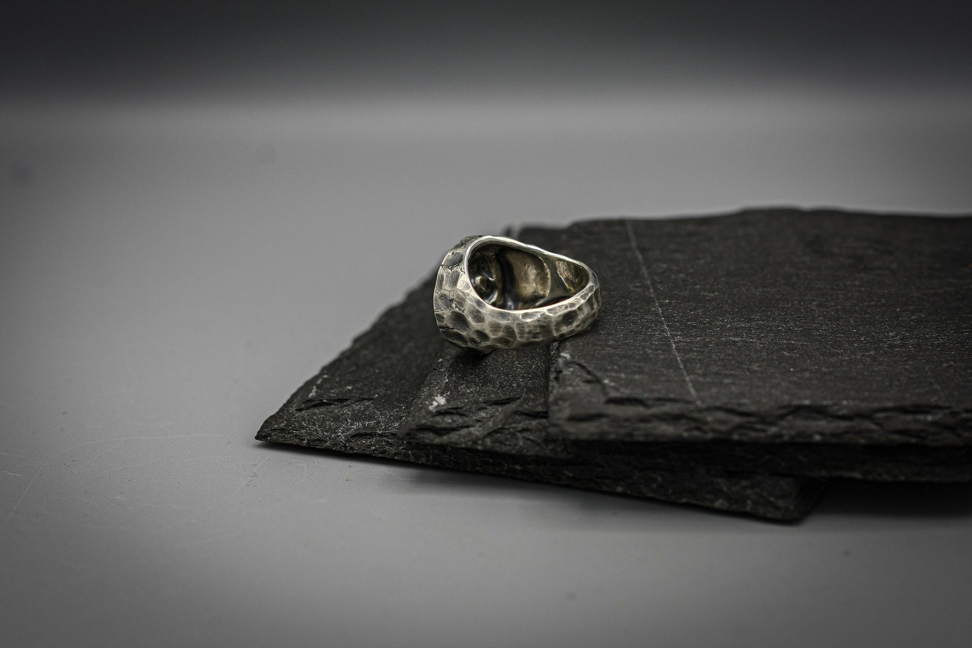 Half skull, half smile, round silver signet ring