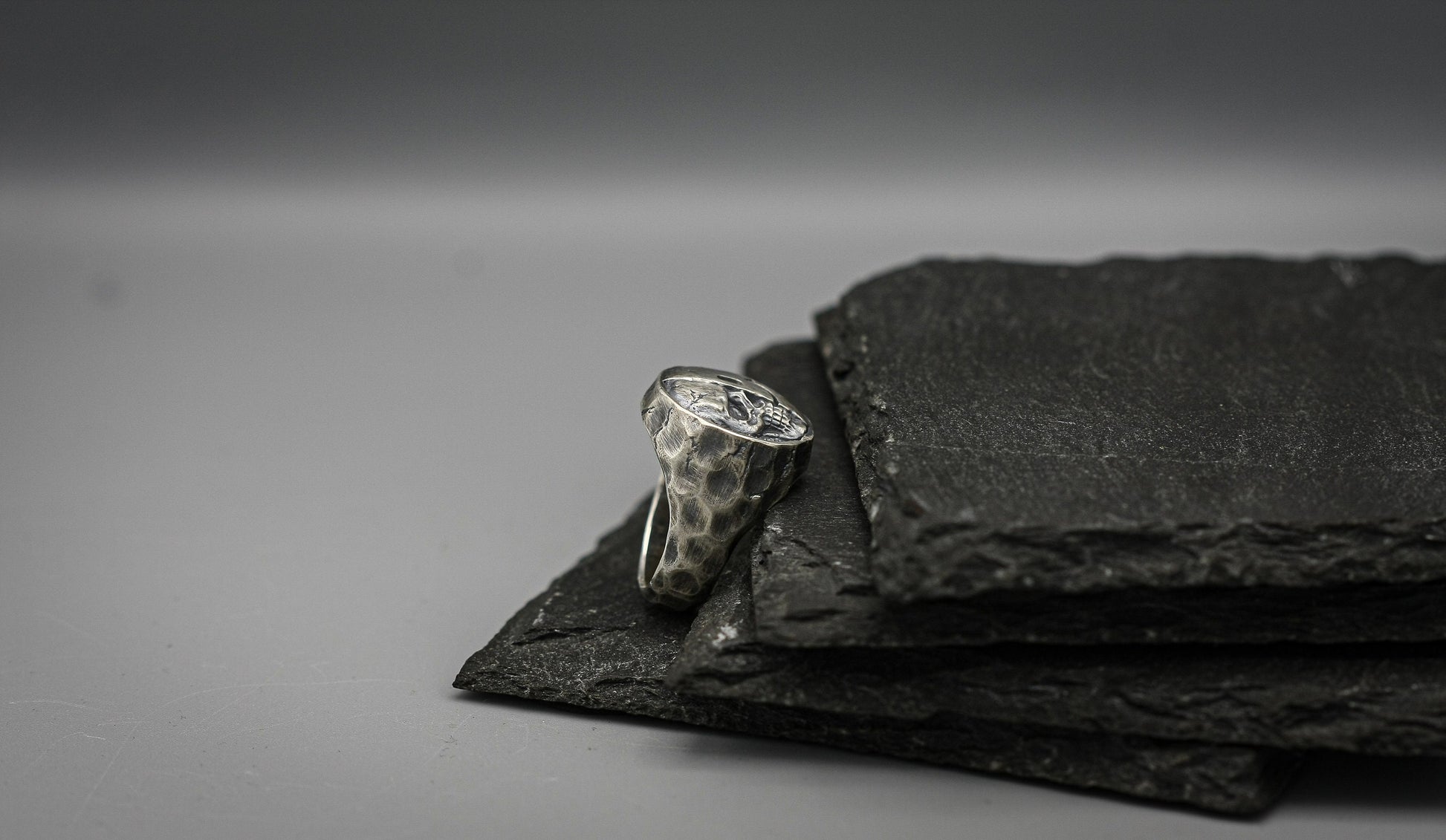 Half skull, half smile, round silver signet ring