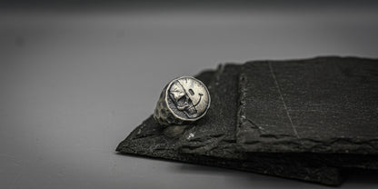 Half skull, half smile, round silver signet ring