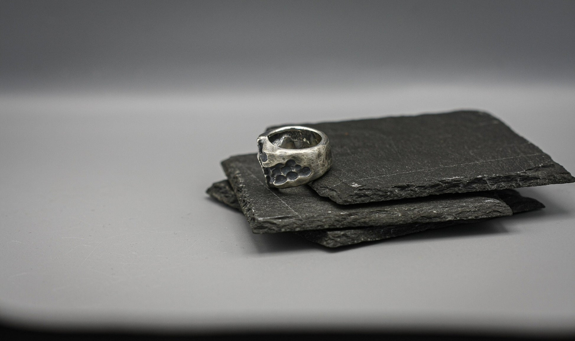 Brutalist cross ring, oxidized Hammered silver band