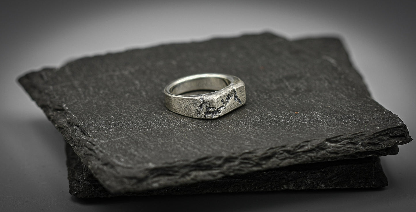 Rough fracture brutalist style band, silver signet ring