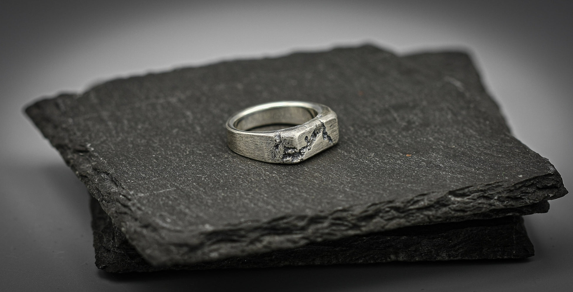 Rough fracture brutalist style band, silver signet ring