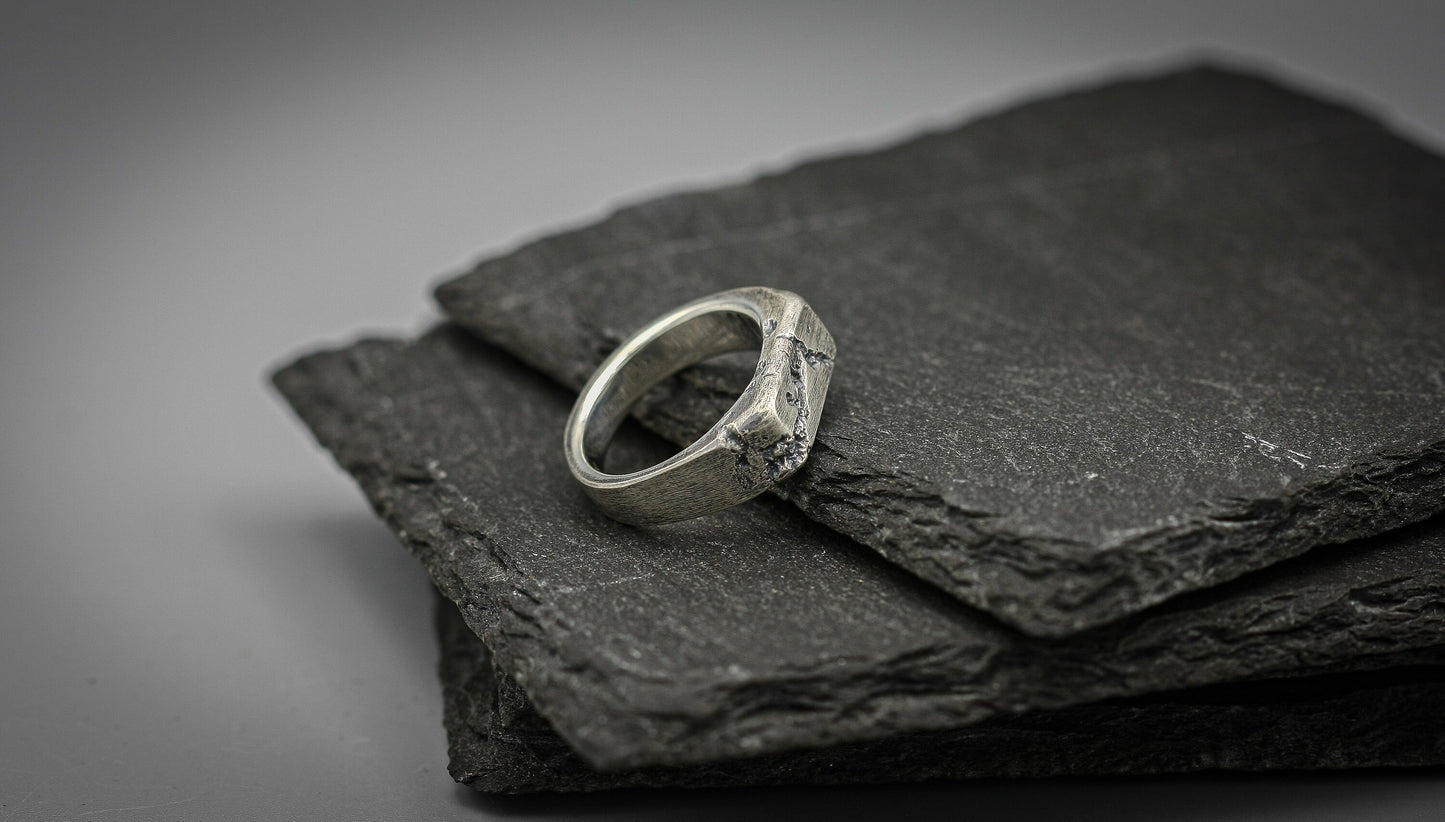 Rough fracture brutalist style band, silver signet ring