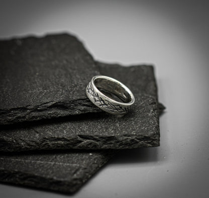 Distressed silver ring, scratched band