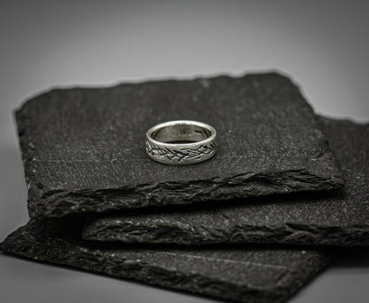 Distressed silver ring, scratched band