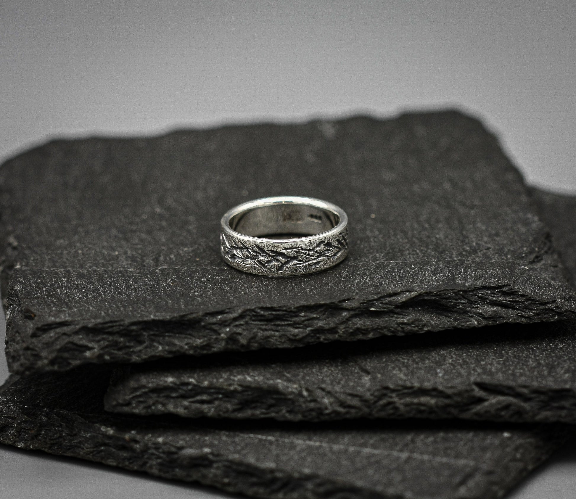 Distressed silver ring, scratched band