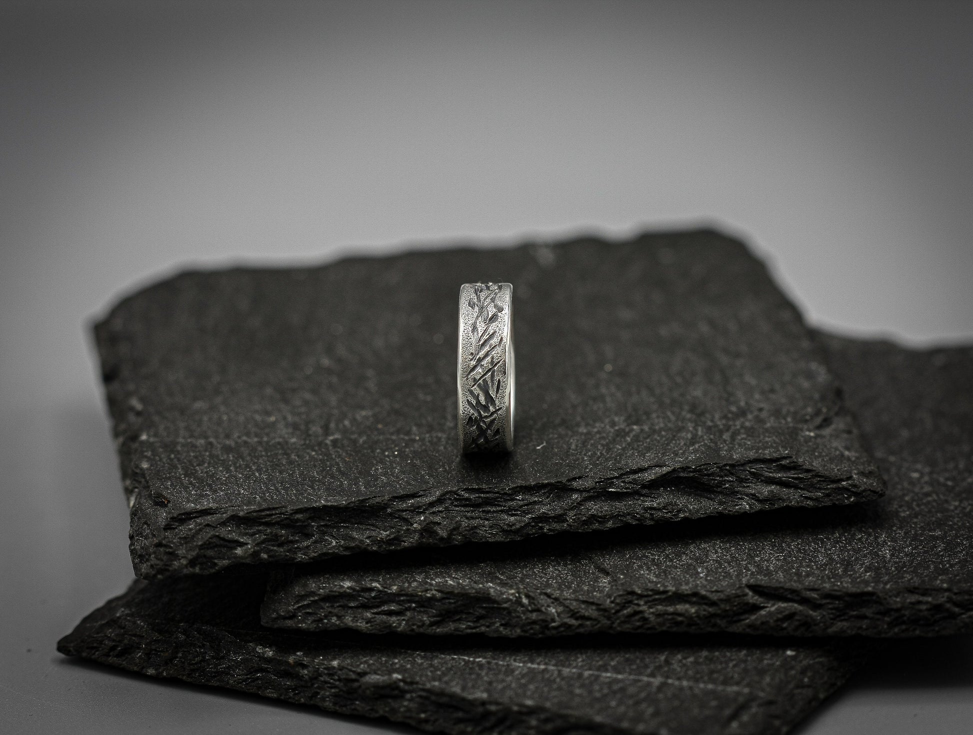 Distressed silver ring, scratched band