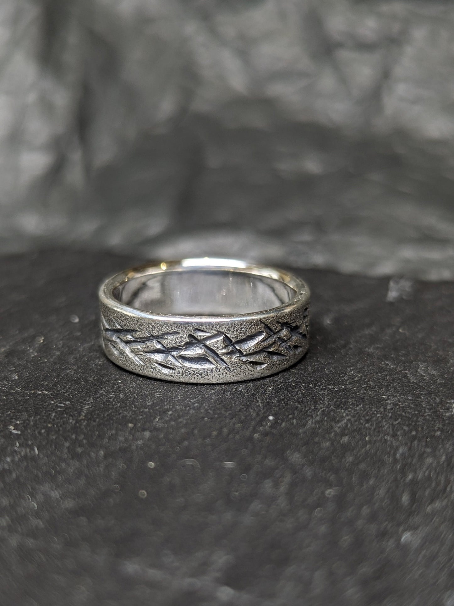 Distressed silver ring, scratched band