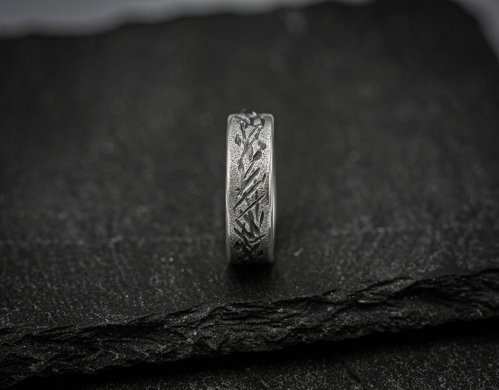 Distressed silver ring, scratched band