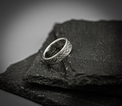 Distressed silver ring, scratched band