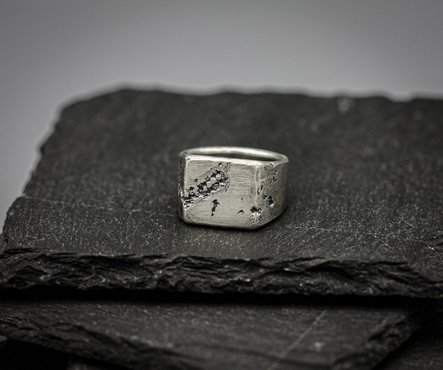 Rough fracture brutalist style band, silver signet ring