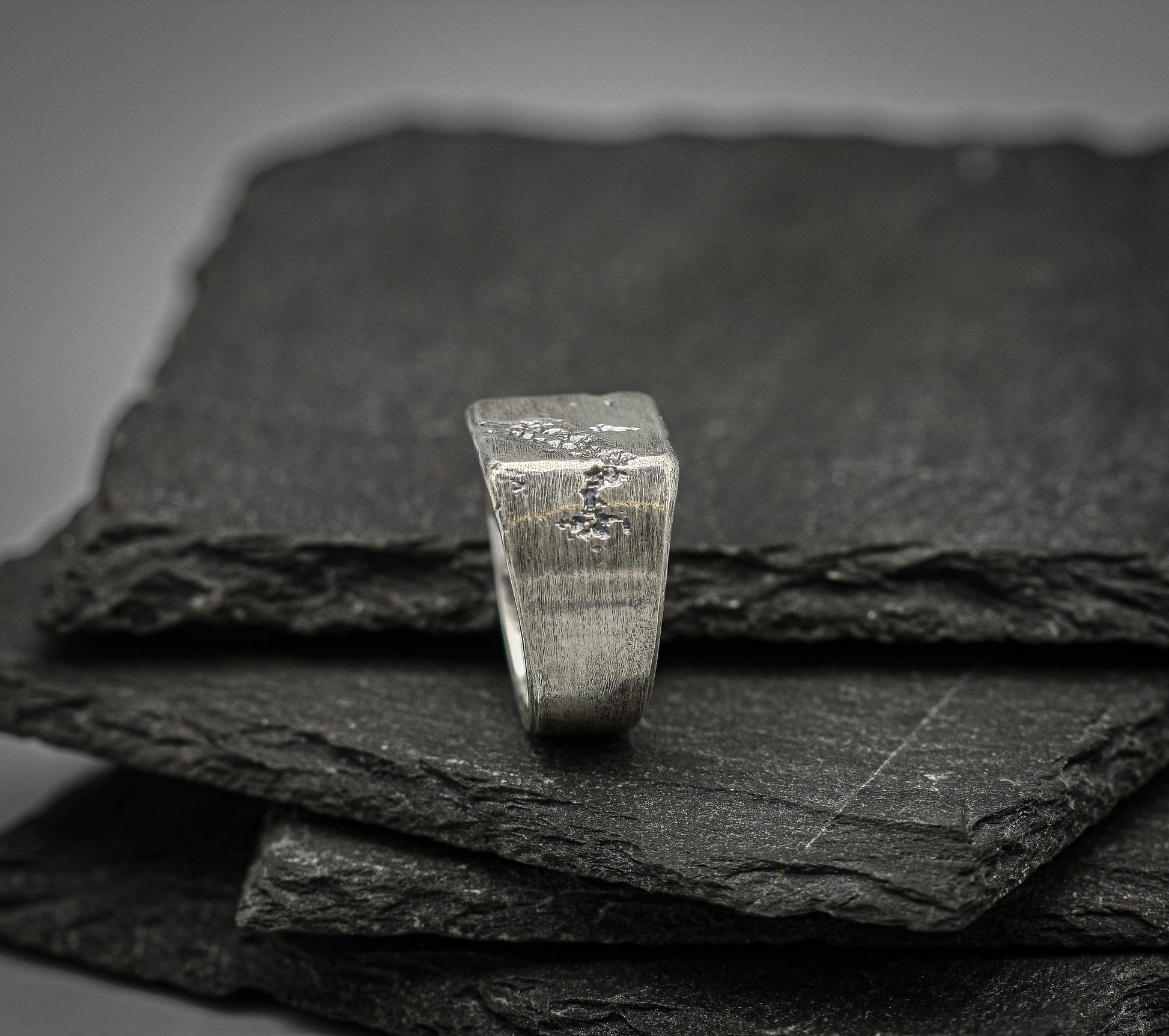 Rough fracture brutalist style band, silver signet ring