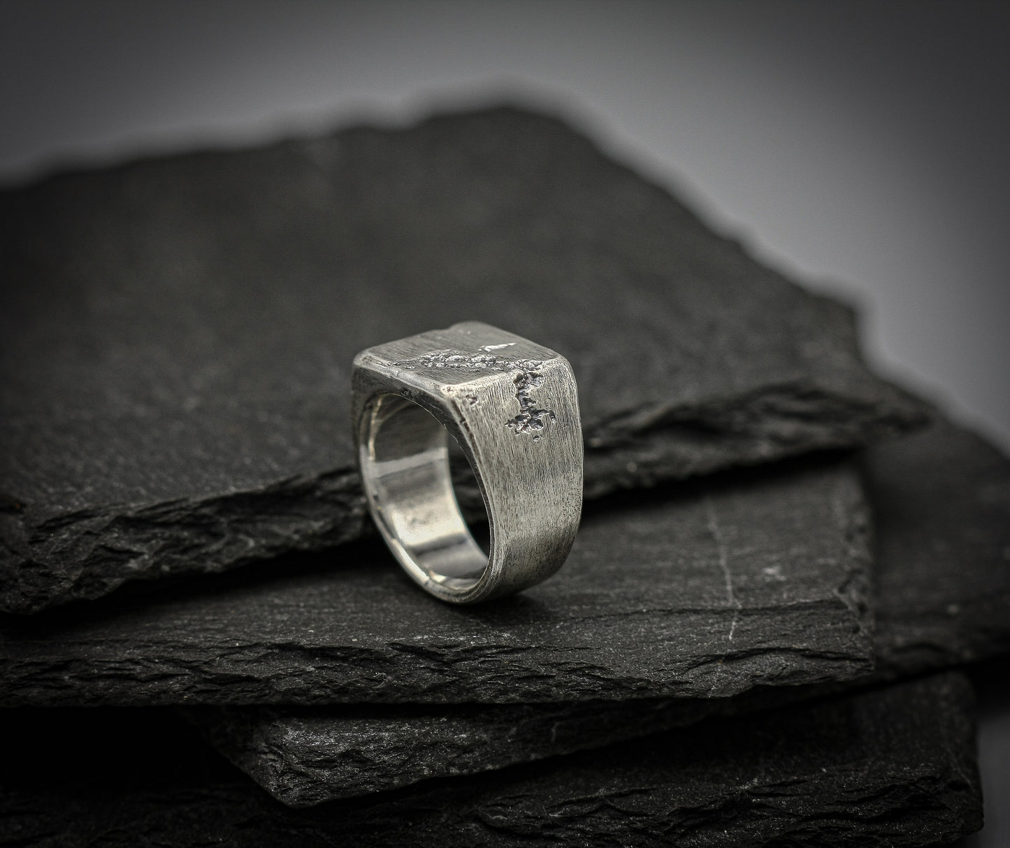 Rough fracture brutalist style band, silver signet ring