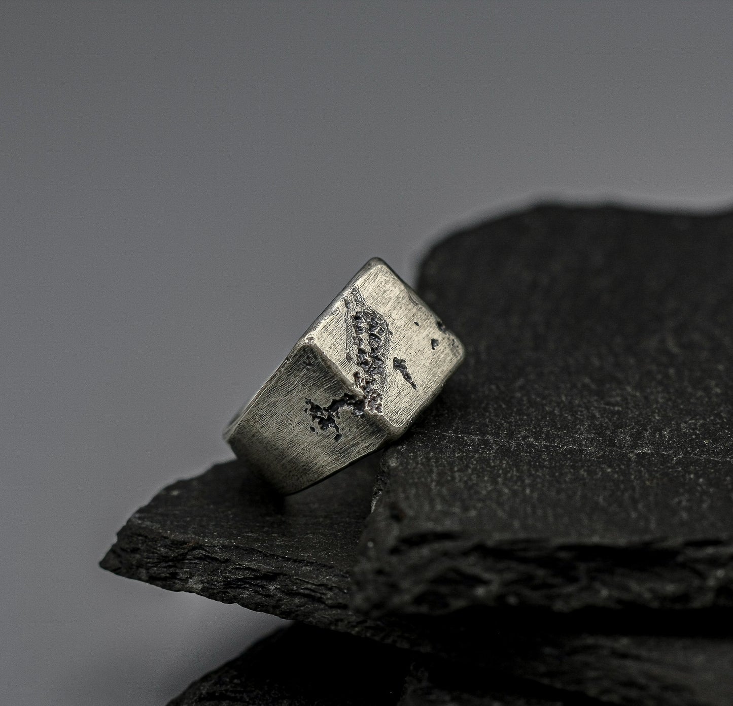 Rough fracture brutalist style band, silver signet ring