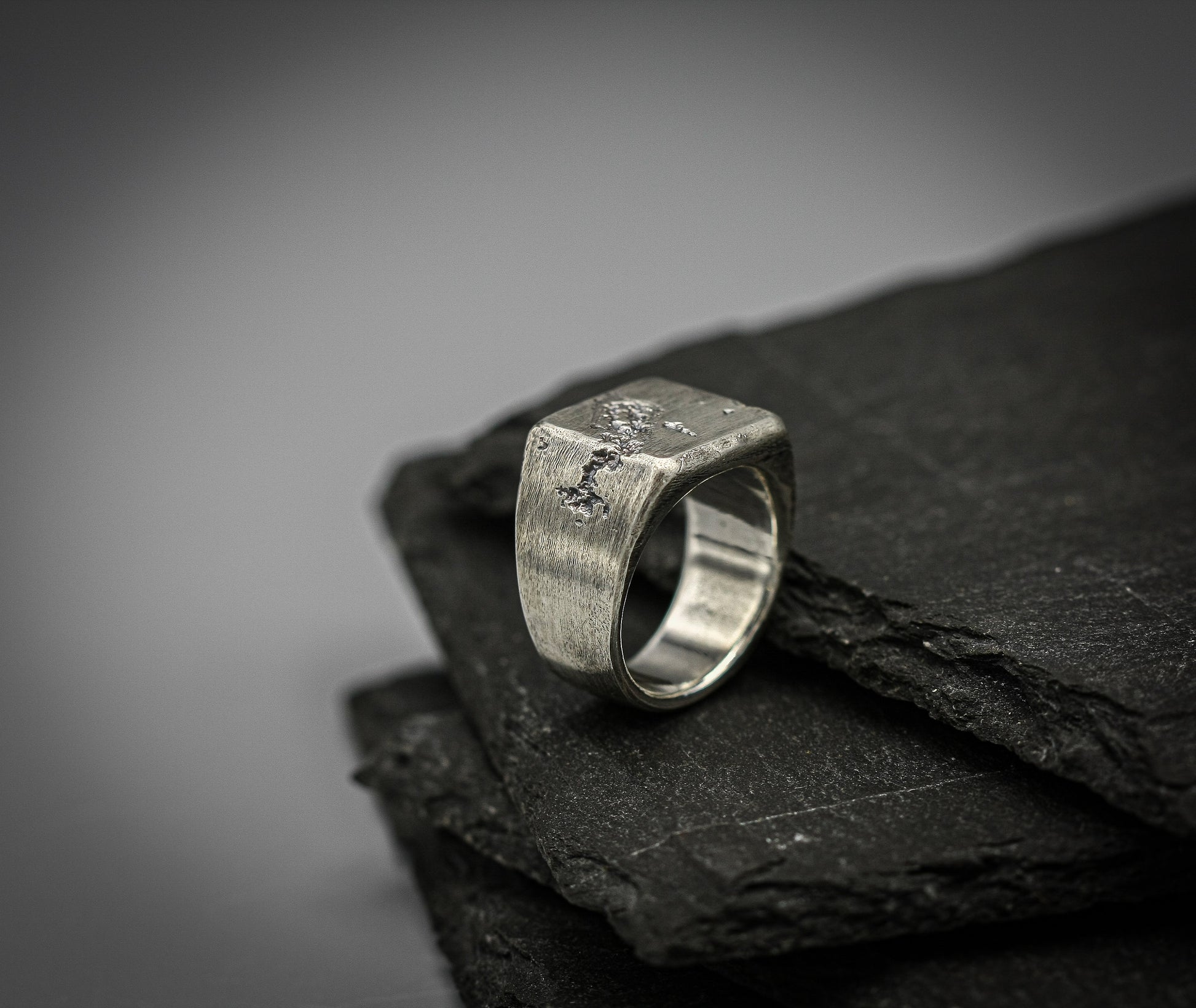 Rough fracture brutalist style band, silver signet ring