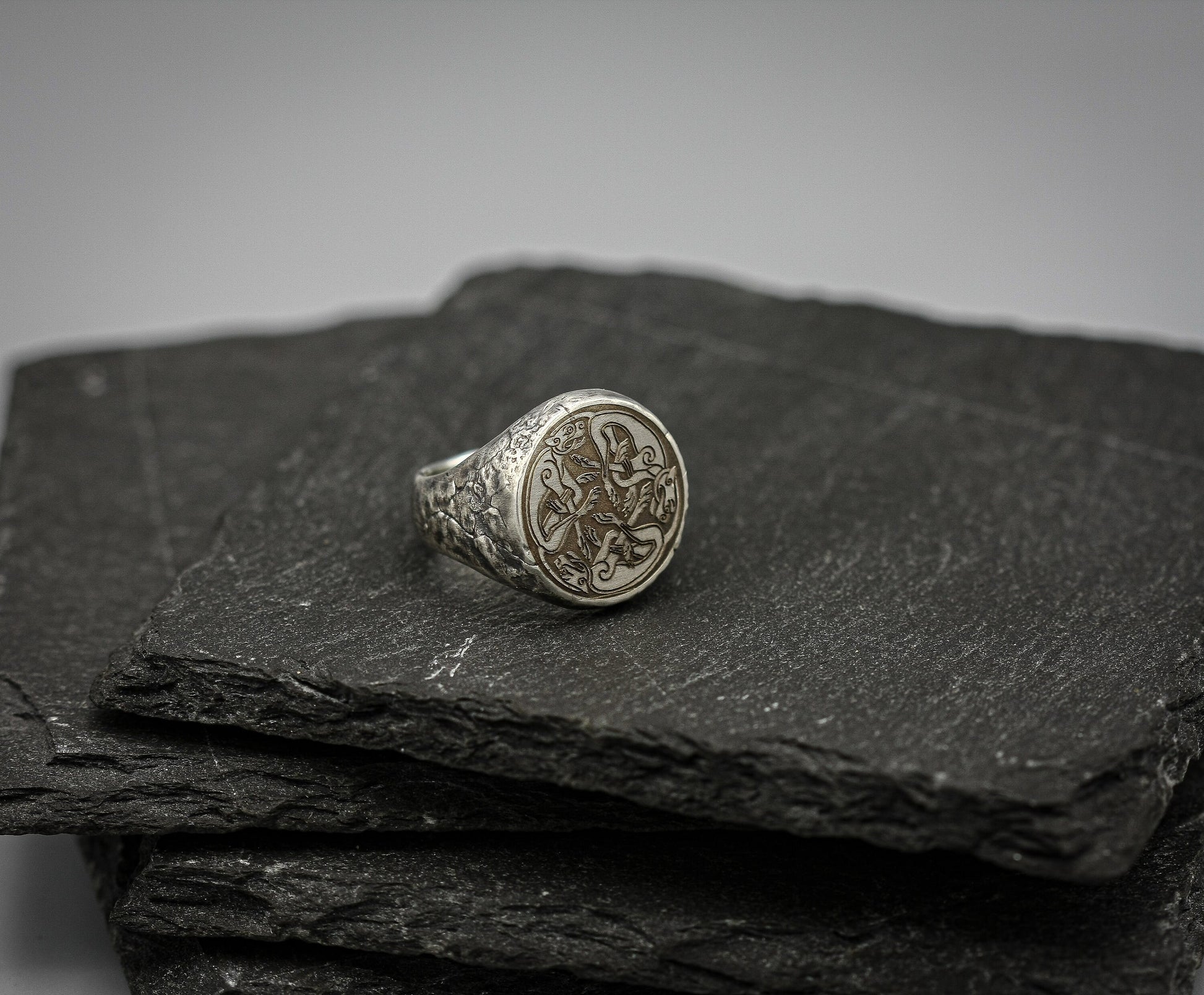 Silver signet ring with Celtic cats symbol engraving