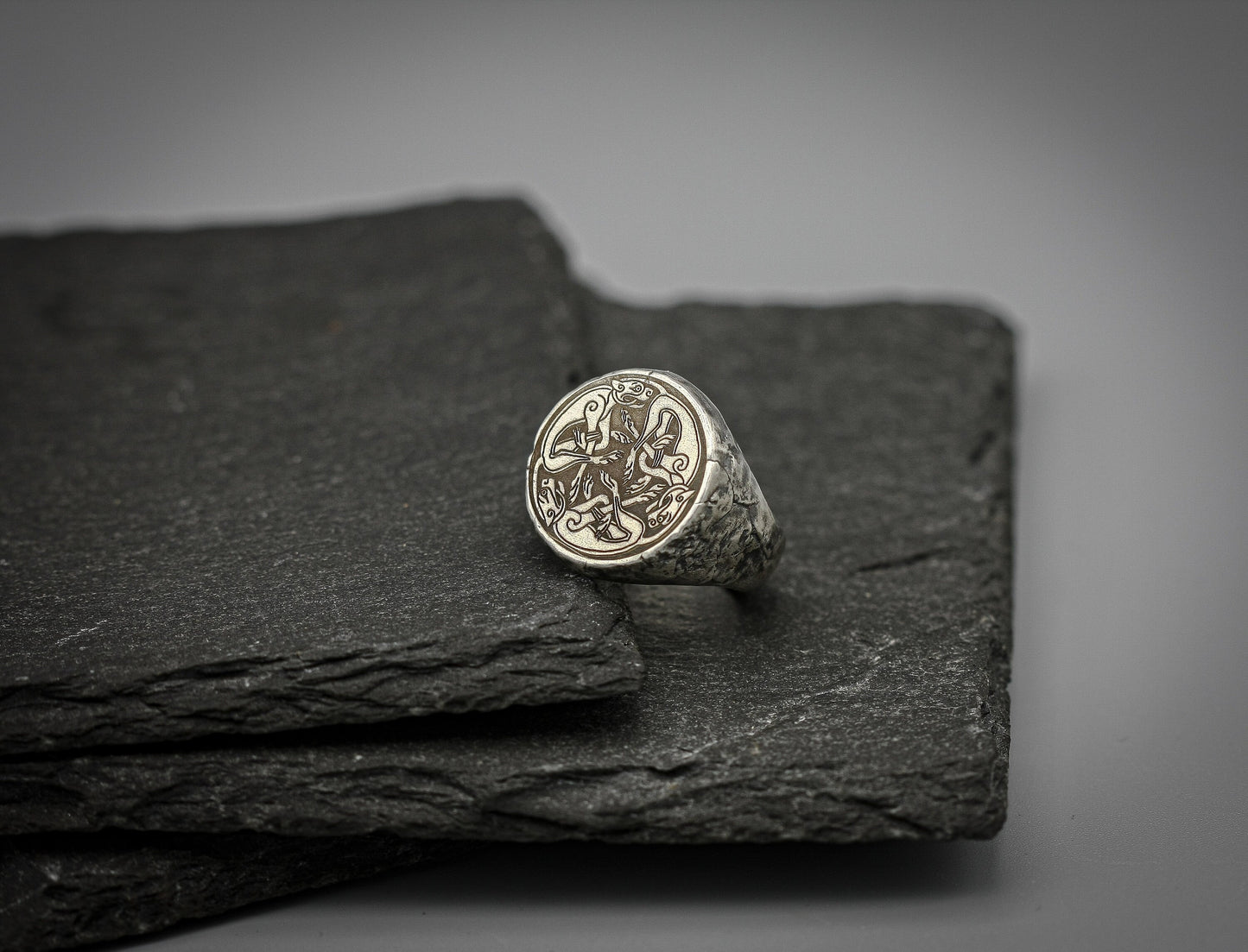 Silver signet ring with Celtic cats symbol engraving