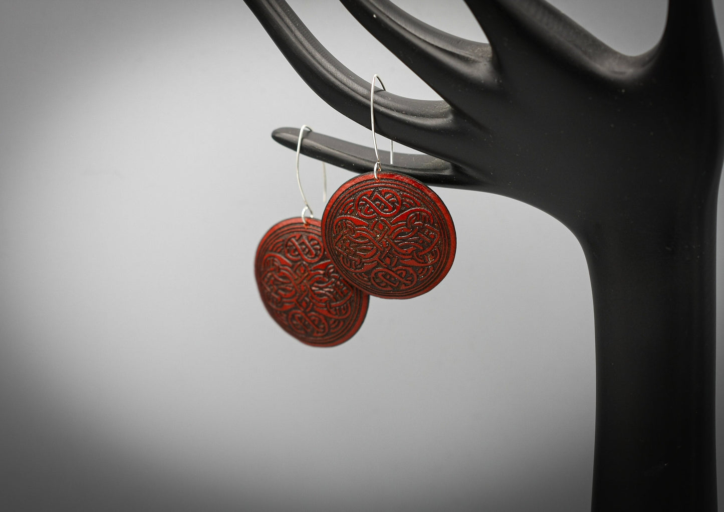 Red round leather Viking earrings, silver hook.