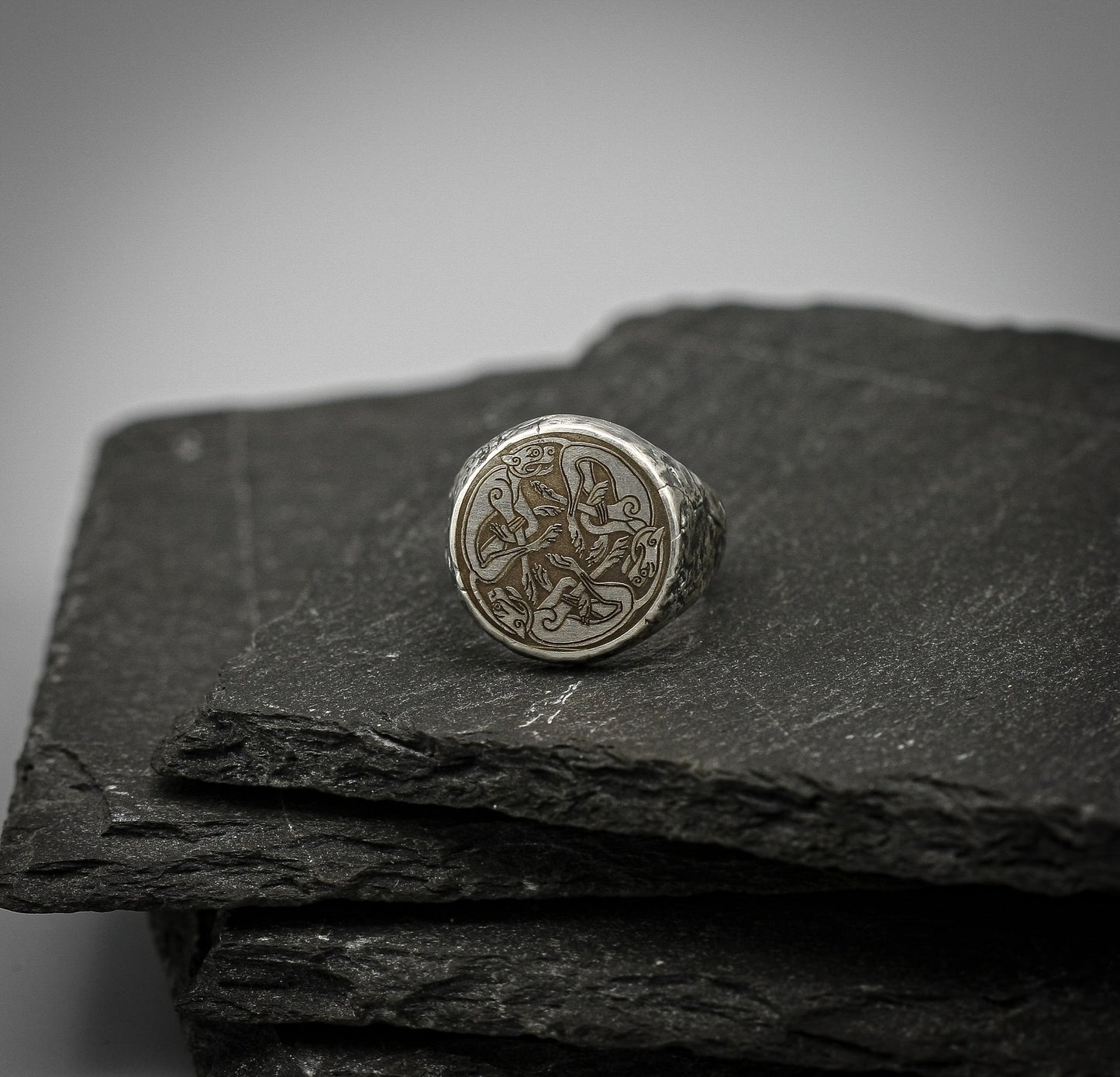 Silver signet ring with Celtic cats symbol engraving