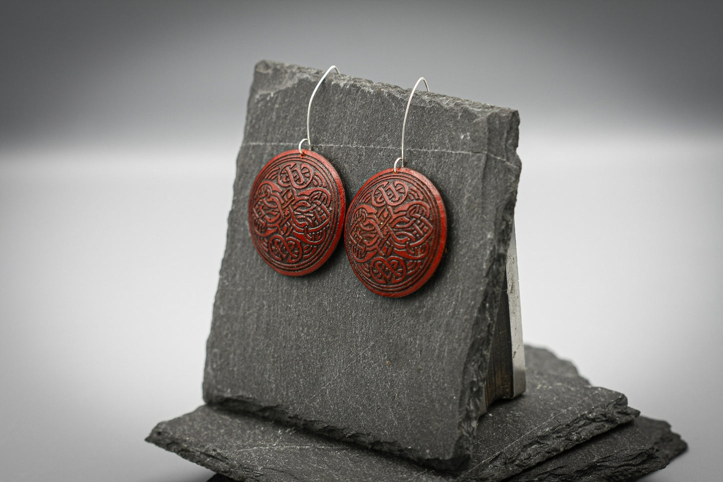 Red round leather Viking earrings, silver hook.