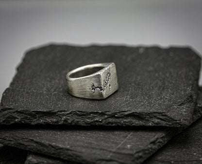 Rough fracture brutalist style band, silver signet ring