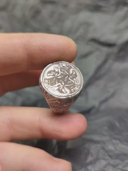 Silver signet ring with Celtic cats symbol engraving