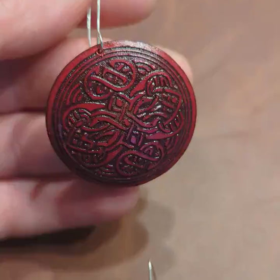 Red round leather Viking earrings, silver hook.